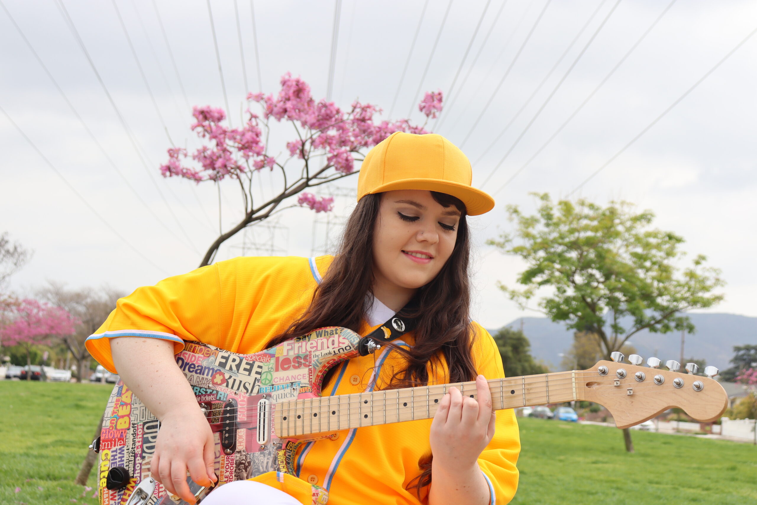 Lindsay Artkop Playing Guitar