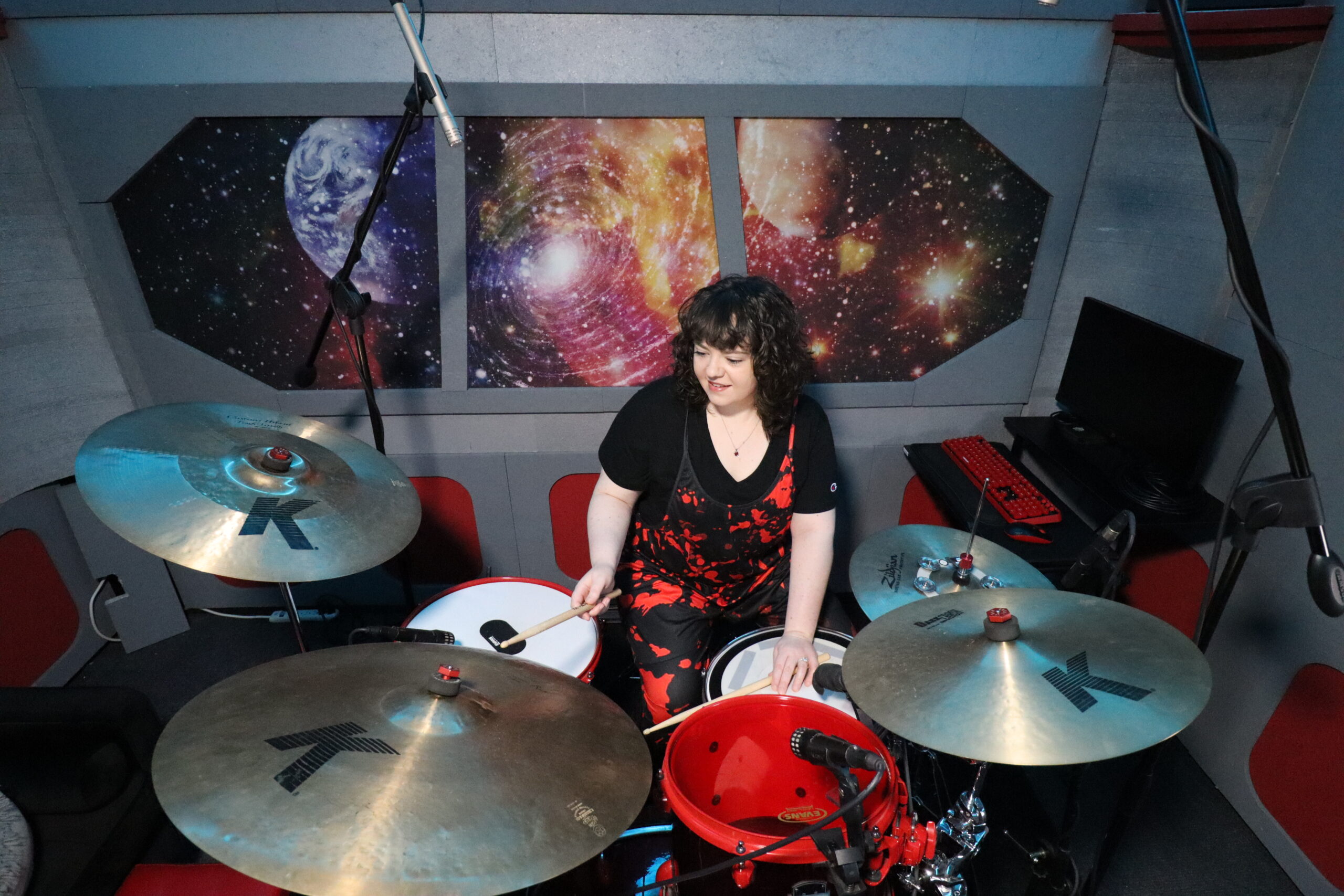 Lindsay Artkop is at her studio in Van Nuys, California playing her red drum set