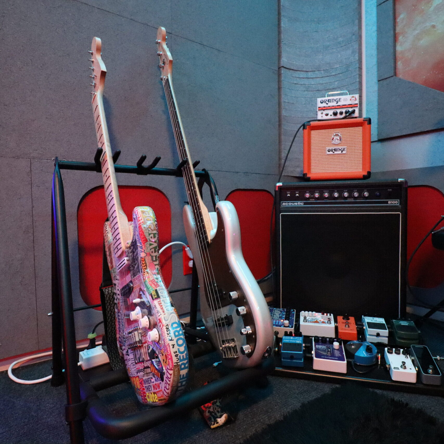 Strat Guitar, Fedner Bass guitar, acoustic bass amp, orange tube guitar amp, pedal board