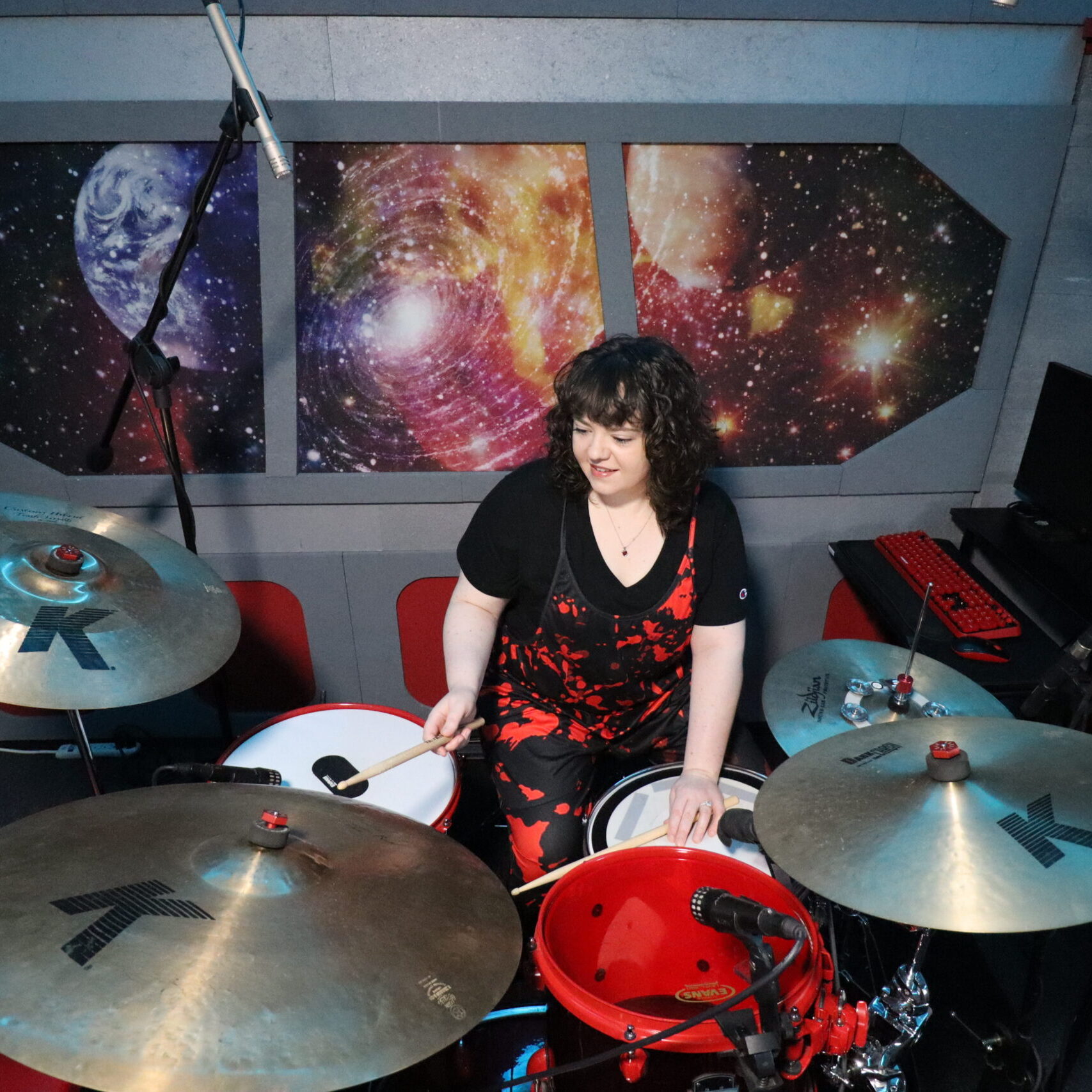 Lindsay Artkop is at her studio in Van Nuys, California playing her red drum set